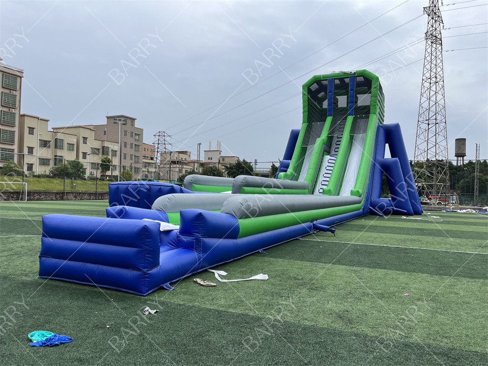 Custom Kid Party Game Tinggi 36x14x13m Tripod Giant Water Slide Untuk Acara Besar 5km Inflatable Obstacle Course